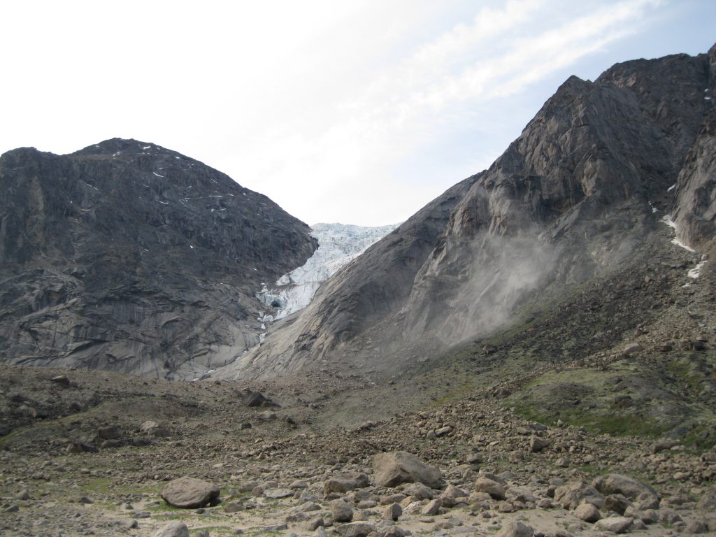 Rock Slide at Tumbing Glacier at Crater Lake - note the dust from the slide